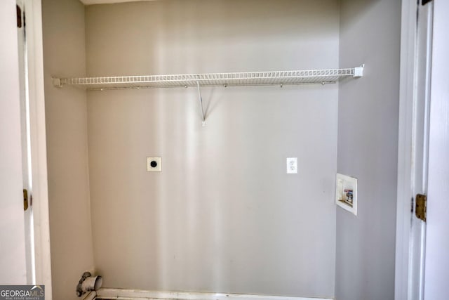 5587 Strathmoor Manor Cir, Lithonia, GA 30058 - laundry room featuring electric dryer hookup and hookup for a washing machine