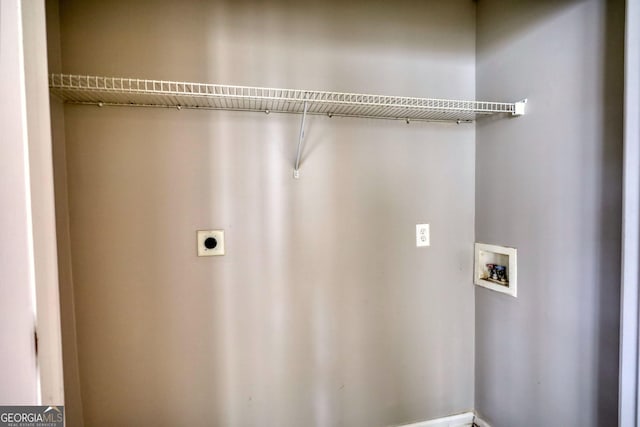 5587 Strathmoor Manor Cir, Lithonia, GA 30058 - laundry room featuring hookup for an electric dryer and washer hookup