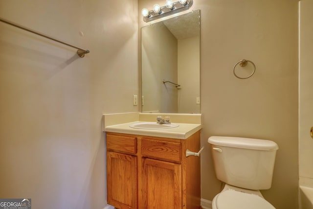 5587 Strathmoor Manor Cir, Lithonia, GA 30058 - bathroom featuring toilet and vanity