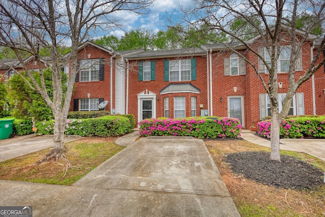 5587 Strathmoor Manor Cir, Lithonia, GA 30058 - view of front of home featuring brick siding