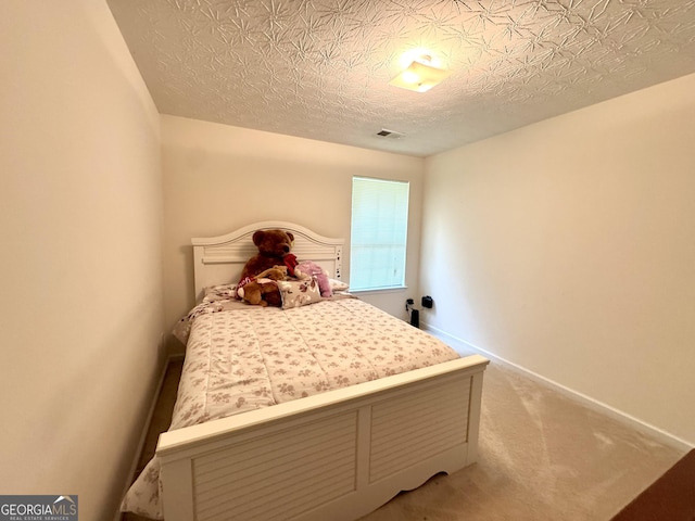105 Avonwood Cir, Locust Grove, GA 30248 - bedroom with light colored carpet and baseboards