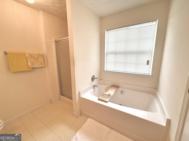 105 Avonwood Cir, Locust Grove, GA 30248 - full bath featuring a stall shower, a bath, tile patterned floors, and baseboards