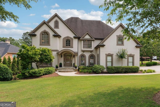 100 Pine Mist Cir, Alpharetta, GA 30022 - french country inspired facade featuring stucco siding and a front yard
