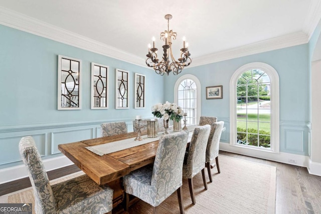 100 Pine Mist Cir, Alpharetta, GA 30022 - dining area featuring a chandelier, wood finished floors, ornamental molding, and wainscoting