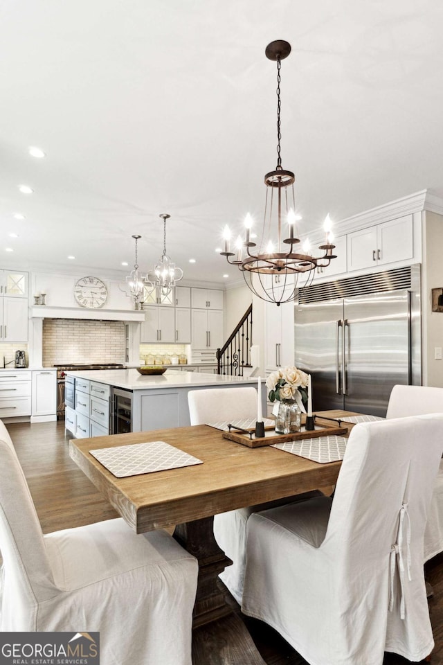 100 Pine Mist Cir, Alpharetta, GA 30022 - dining area featuring a chandelier, wine cooler, recessed lighting, and dark wood-style flooring