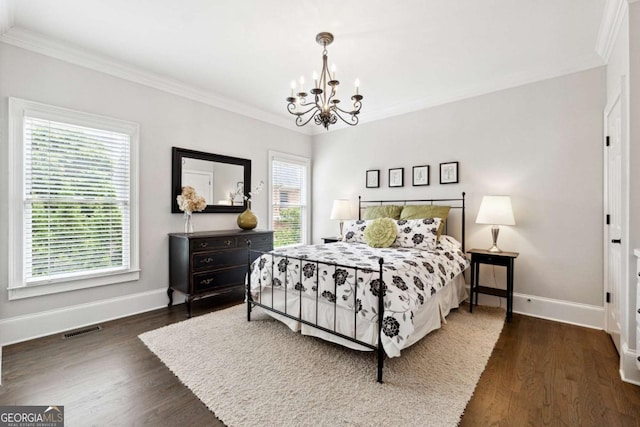 100 Pine Mist Cir, Alpharetta, GA 30022 - bedroom with a chandelier, crown molding, baseboards, and wood finished floors