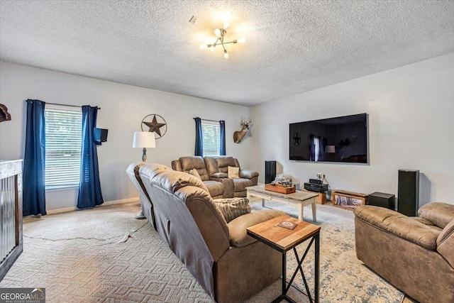 6121 Peake Rd, Macon, GA 31220 - living area featuring a textured ceiling, healthy amount of natural light, and carpet floors