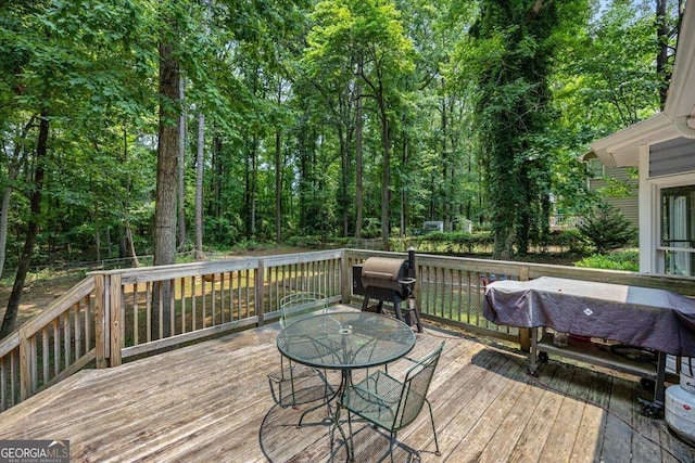 6121 Peake Rd, Macon, GA 31220 - wooden terrace with outdoor dining area