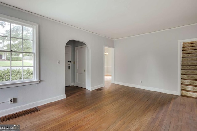 170 Stanton Way, Athens, GA 30606 - unfurnished room with hardwood / wood-style floors, arched walkways, stairway, and crown molding