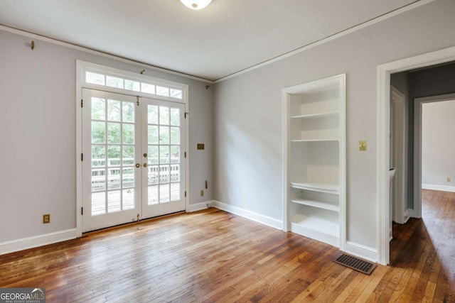 170 Stanton Way, Athens, GA 30606 - unfurnished room featuring hardwood / wood-style floors, french doors, baseboards, and crown molding