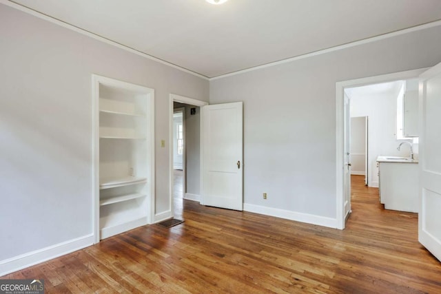 170 Stanton Way, Athens, GA 30606 - unfurnished bedroom featuring wood finished floors and crown molding