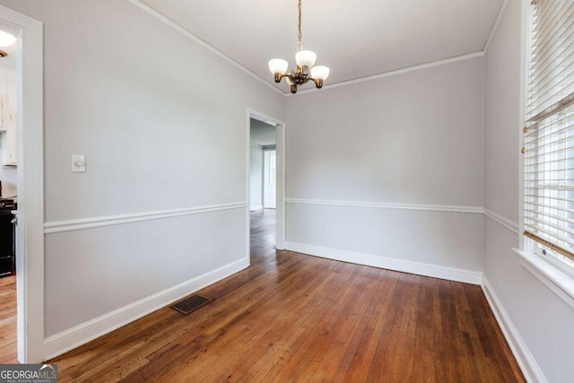 170 Stanton Way, Athens, GA 30606 - unfurnished dining area with a chandelier, ornamental molding, and hardwood / wood-style flooring