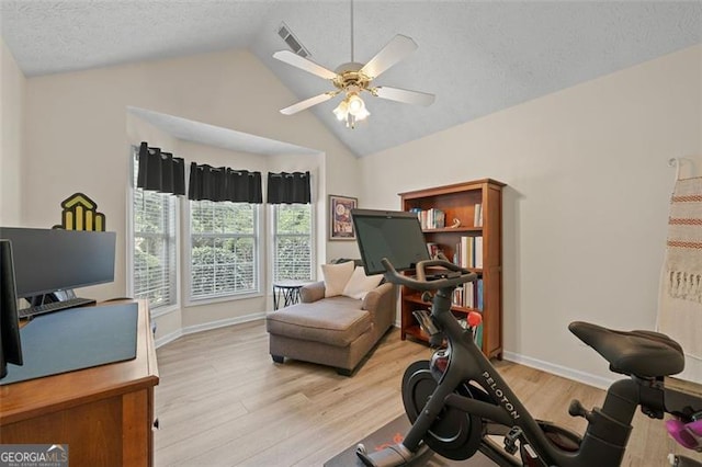 1865 Morgans Run Trl, Buford, GA 30519 - workout room with light wood finished floors, ceiling fan, a textured ceiling, and high vaulted ceiling