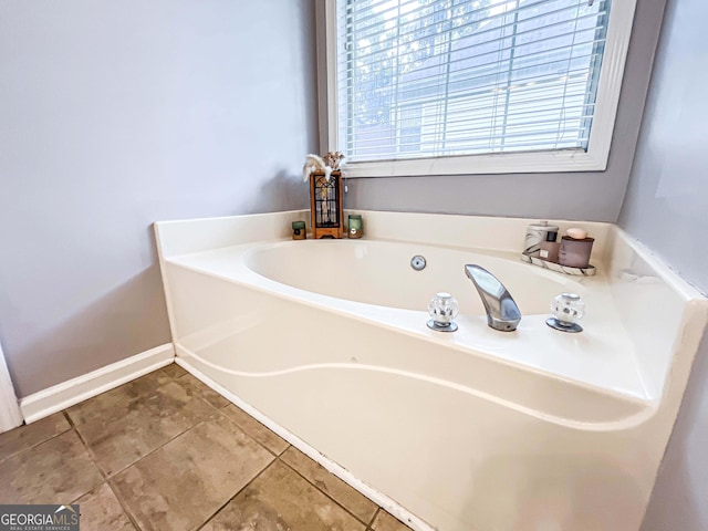 329 Royal Crescent Way, Stockbridge, GA 30281 - full bath with a garden tub and baseboards