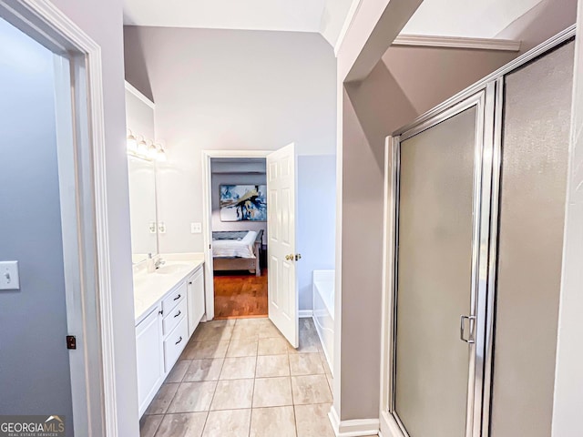 329 Royal Crescent Way, Stockbridge, GA 30281 - ensuite bathroom featuring vanity, a shower stall, a garden tub, and tile patterned floors