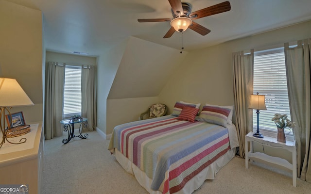 60 Villa Cts, Hartwell, GA 30643 - carpeted bedroom with vaulted ceiling and ceiling fan