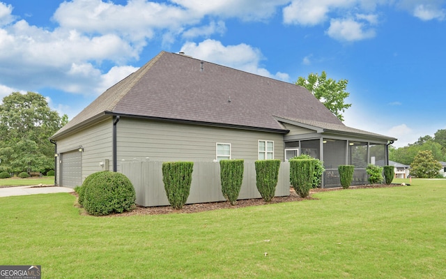 60 Villa Cts, Hartwell, GA 30643 - view of home's exterior featuring a sunroom, concrete driveway, a lawn, a garage, and a shingled roof