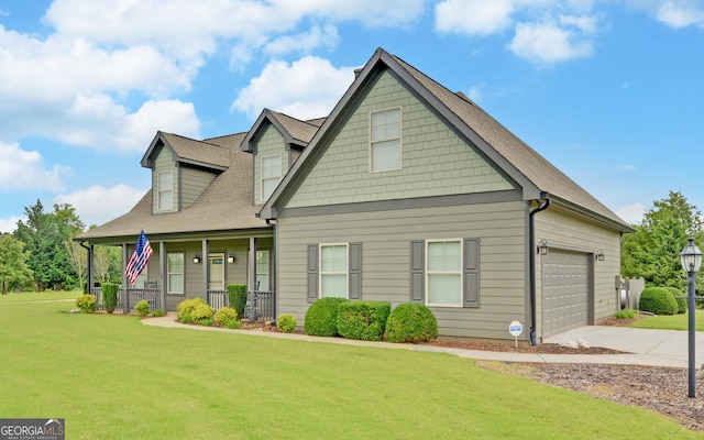 60 Villa Cts, Hartwell, GA 30643 - view of front facade featuring covered porch, concrete driveway, a front yard, and a garage
