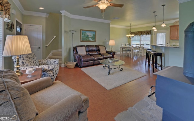 60 Villa Cts, Hartwell, GA 30643 - living room featuring ceiling fan, crown molding, a chandelier, stairs, and baseboards