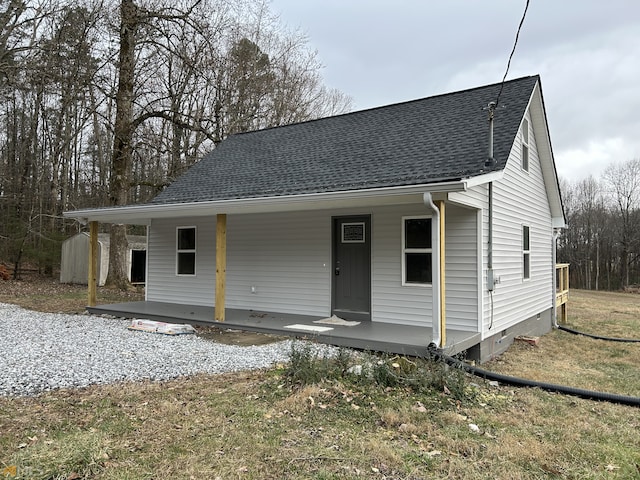 1679 Rock Rd, Mount Airy, GA 30563 - view of front of home with a porch, a shingled roof, and crawl space