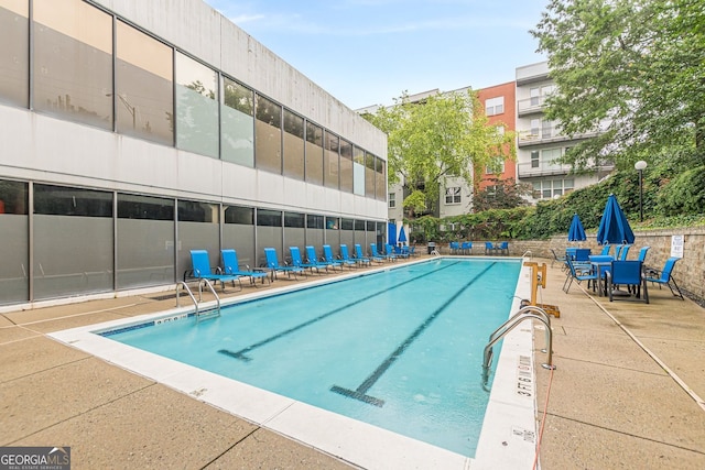 120 Ralph Mcgill Blvd NE Unit 1502, Atlanta, GA 30308 - community pool featuring a patio area