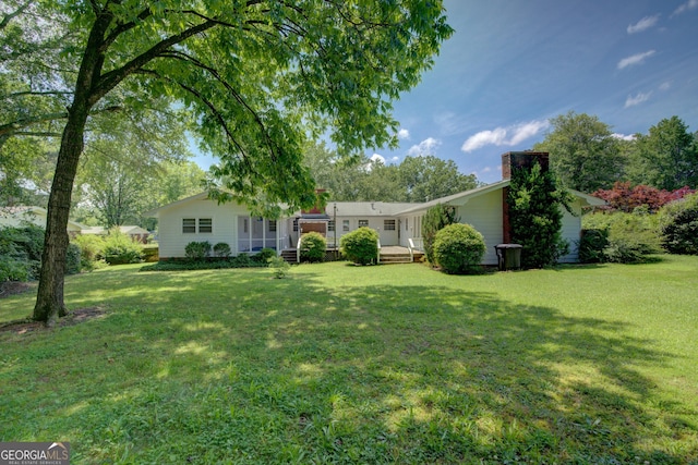 25 Ridge Dr SW, Rome, GA 30165 - view of front of house featuring a front yard and a chimney
