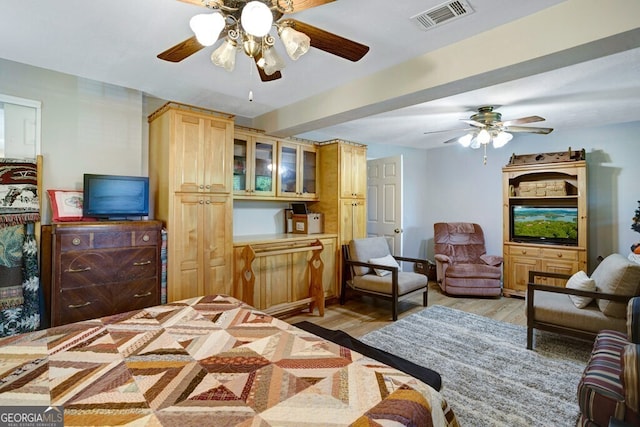 557 Hidden Pines Ct, Hiawassee, GA 30546 - bedroom featuring light wood finished floors and ceiling fan
