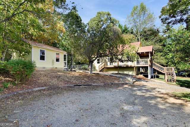 557 Hidden Pines Ct, Hiawassee, GA 30546 - view of front of house featuring stairs and crawl space