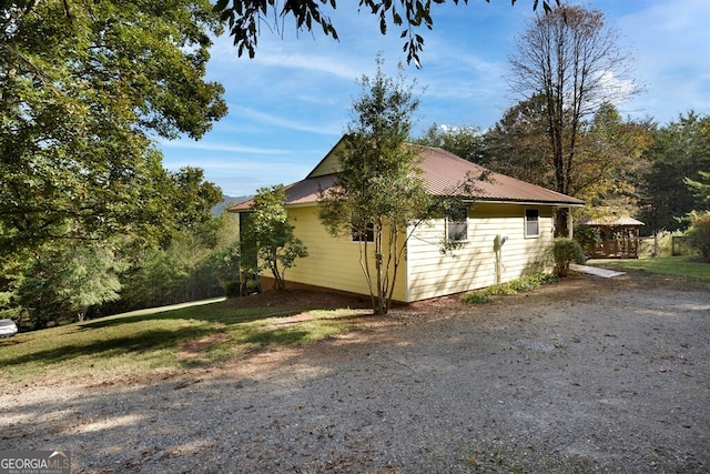 557 Hidden Pines Ct, Hiawassee, GA 30546 - view of property exterior featuring metal roof