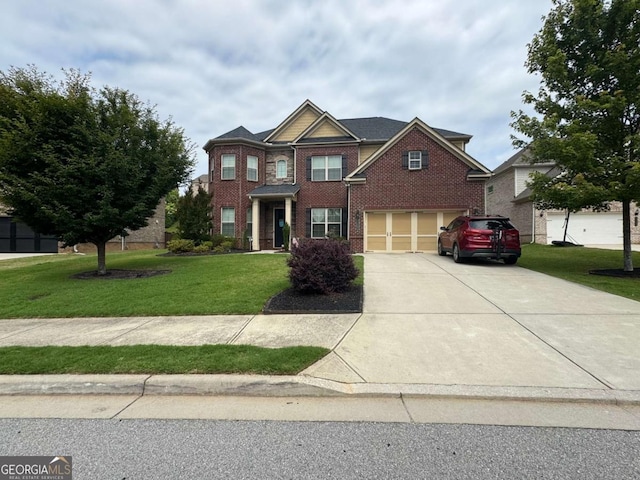 3352 Stone Point Way, Buford, GA 30519 - view of front of house with driveway, brick siding, a front lawn, and a garage