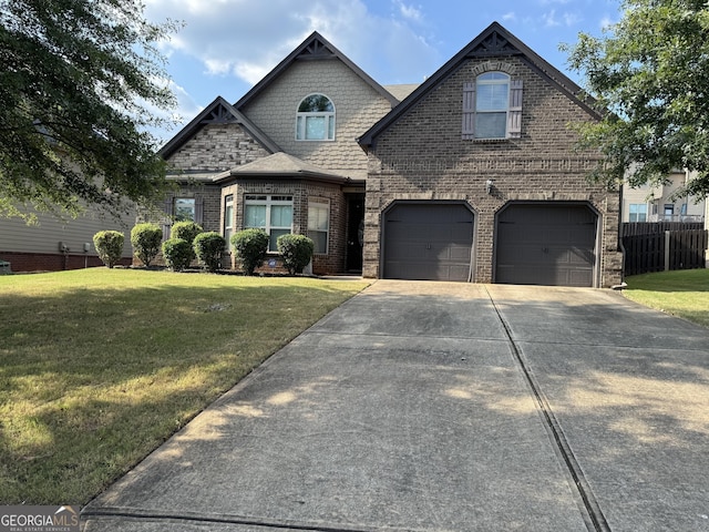 860 Nevis Way, Mcdonough, GA 30253 - view of front facade with brick siding, a garage, and driveway