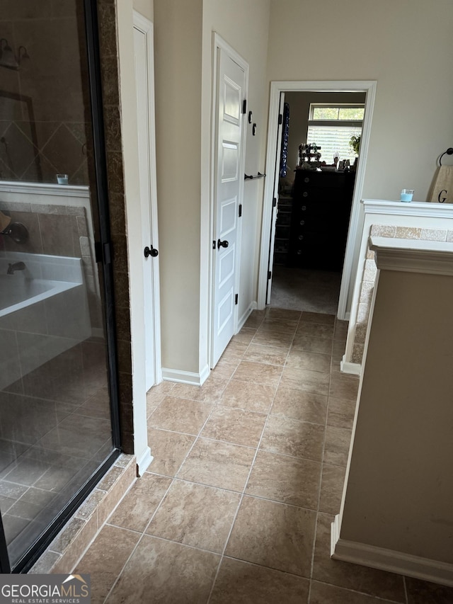 860 Nevis Way, Mcdonough, GA 30253 - hall featuring tile patterned flooring and baseboards