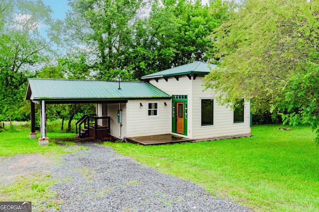 5198 Hwy 52 E, Ellijay, GA 30536 - view of front of home featuring a front lawn, metal roof, driveway, and a wooden deck