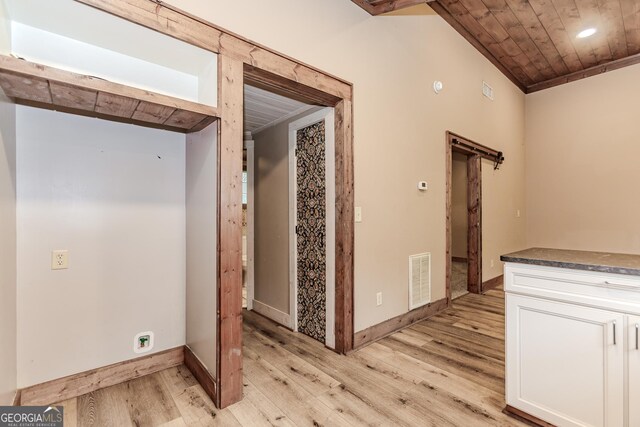 5198 Hwy 52 E, Ellijay, GA 30536 - empty room featuring light wood-type flooring, wood ceiling, baseboards, and ornamental molding
