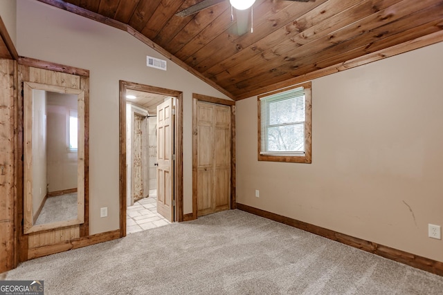 5198 Hwy 52 E, Ellijay, GA 30536 - unfurnished bedroom featuring vaulted ceiling, light colored carpet, wood ceiling, baseboards, and connected bathroom