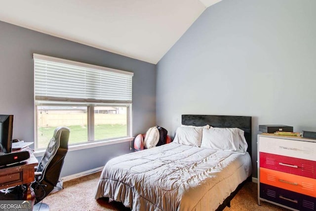3746 Okefenokee Rdg, Loganville, GA 30052 - bedroom featuring carpet flooring, vaulted ceiling, and an office area