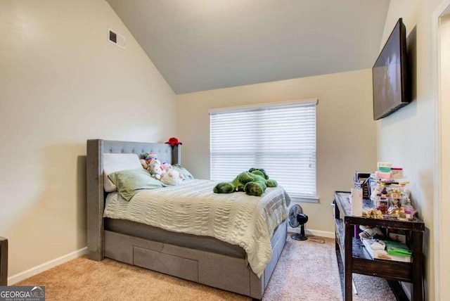 3746 Okefenokee Rdg, Loganville, GA 30052 - carpeted bedroom featuring vaulted ceiling and baseboards
