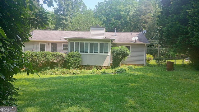 61 Maxie Ln, Dallas, GA 30157 - rear view of house with a chimney