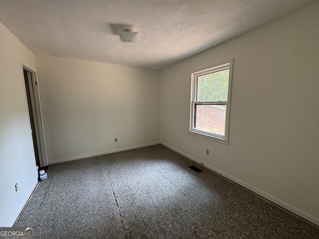 427 Bakers Fiord, Sautee Nacoochee, GA 30571 - unfurnished room featuring baseboards and a textured ceiling