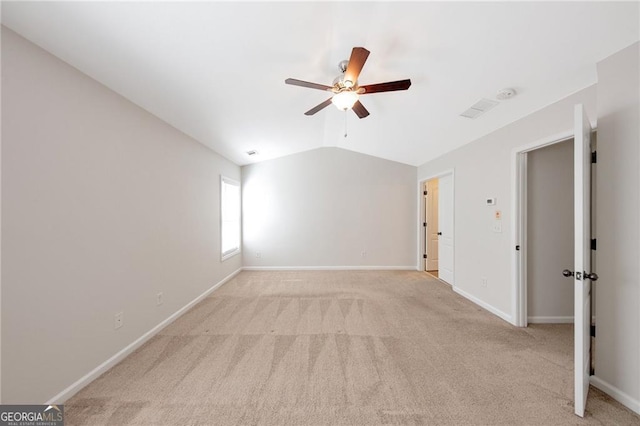 436 Crestmont Ln, Canton, GA 30114 - empty room with a ceiling fan, vaulted ceiling, light carpet, and baseboards