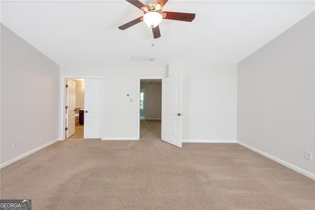 436 Crestmont Ln, Canton, GA 30114 - unfurnished bedroom featuring light carpet, baseboards, and a ceiling fan