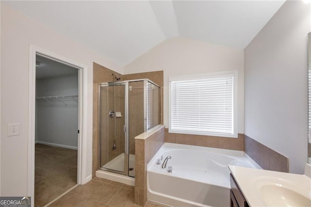 436 Crestmont Ln, Canton, GA 30114 - full bathroom with a stall shower, a garden tub, vanity, lofted ceiling, and tile patterned flooring
