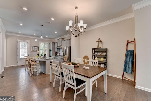 747 Topsail Ln, Alpharetta, GA 30005 - dining room featuring a chandelier, crown molding, dark wood-style floors, and recessed lighting