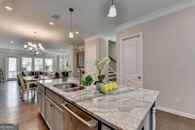 747 Topsail Ln, Alpharetta, GA 30005 - kitchen featuring dishwasher, ornamental molding, a chandelier, open floor plan, and dark wood-style floors