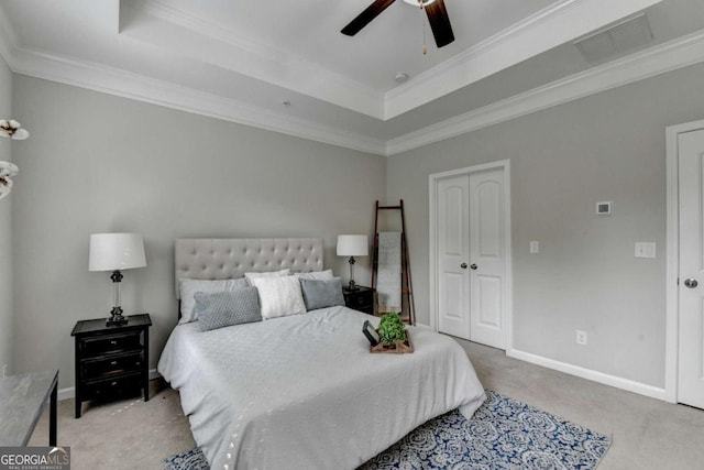 747 Topsail Ln, Alpharetta, GA 30005 - bedroom with a tray ceiling, carpet flooring, ornamental molding, a closet, and a ceiling fan