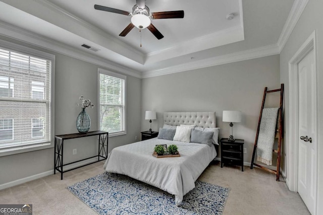 747 Topsail Ln, Alpharetta, GA 30005 - bedroom with light colored carpet, a tray ceiling, crown molding, and a ceiling fan