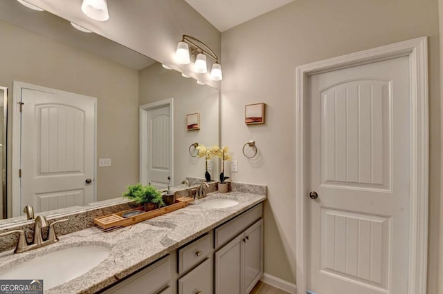 747 Topsail Ln, Alpharetta, GA 30005 - full bathroom featuring double vanity and baseboards