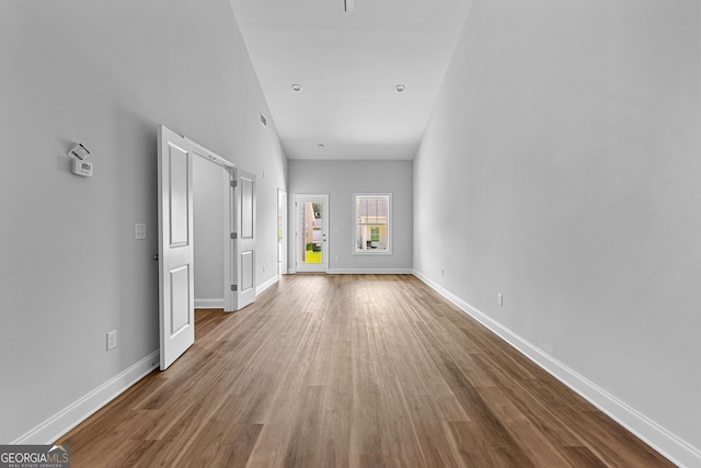 215 Lenox Cir, Lagrange, GA 30241 - unfurnished living room featuring wood finished floors and baseboards