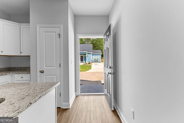 215 Lenox Cir, Lagrange, GA 30241 - doorway to outside with light wood-type flooring and baseboards