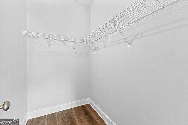 215 Lenox Cir, Lagrange, GA 30241 - walk in closet with dark wood finished floors